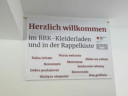 Herzlich willkommen Banner mit Schrift Herzlich willkommen